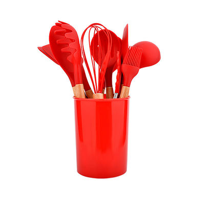 Casserotti in ghisa a smalto rosso con set di posate in silicone