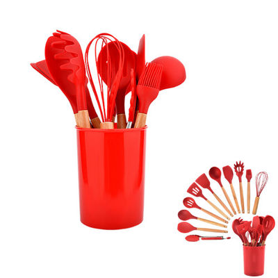 Casserotti in ghisa a smalto rosso con set di posate in silicone