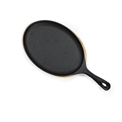 Vassoio BSCI di Matt Black Cast Iron Sizzle con la fajita bassa di legno