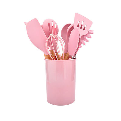 Il silicone antiaderante che cucina l'utensile di colore ha messo l'insieme di strumenti della cucina